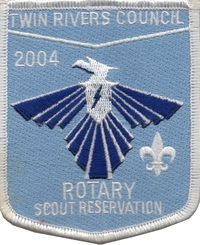 A patch with a light blue background and a dark blue phoenix with a thunder bold in the center of its chest.  It says 