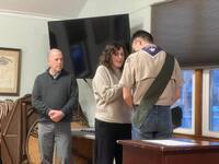 Liam getting his Eagle pin pinned on his uniform.