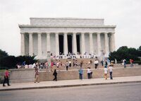 Photo of the Lincoln Memorial from the outside.  Scouts are halfway up walking towards the enterance.